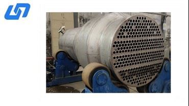 Titāna apvalka un cauruļu siltummainis